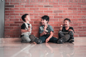 Three boys eating icecream photo